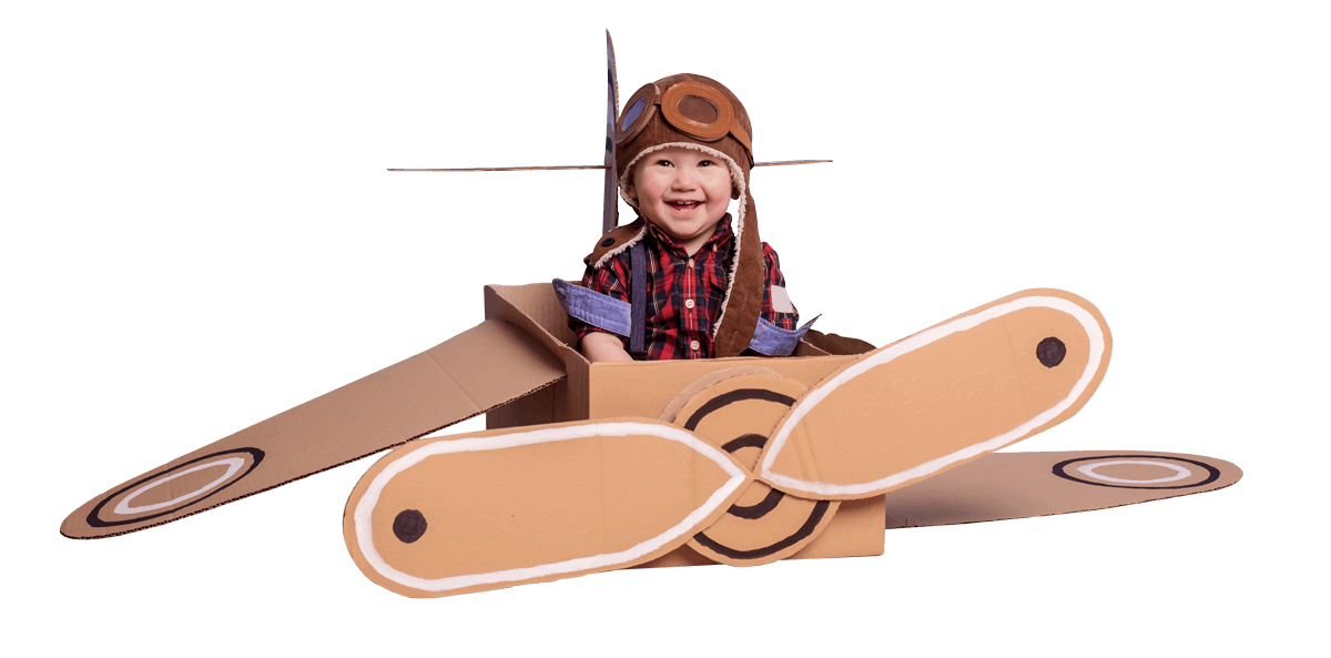 baby in a cardboard plane